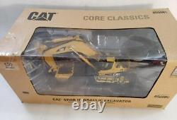 1150 Diecast Masters 85098C CAT Caterpillar 5110B Hydraulic Excavator Torn Box