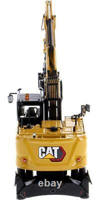 CAT Caterpillar M318 Wheeled Excavator Yellow with Operator 1/50 Diecast Model