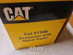 Norscot 55098 Caterpillar 5110B Metal Track Excavator 1/50 scale box has wear