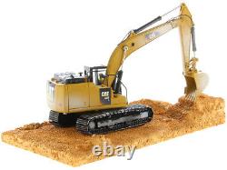 Excavatrice à chenilles Cat Caterpillar 320f usée 1/50 par Diecast Masters 85701